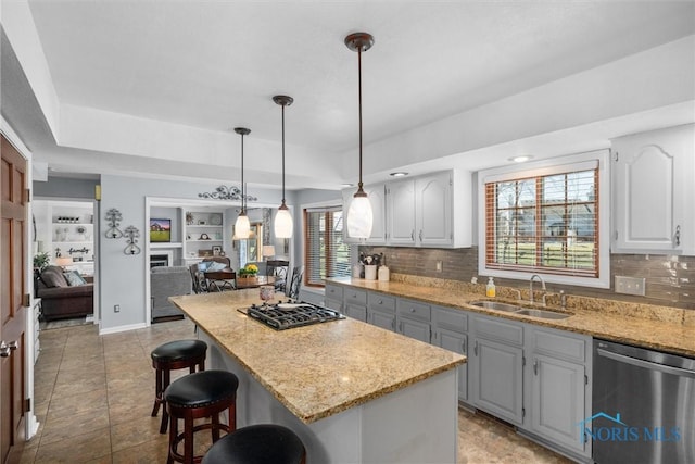 9627 Sheffield Rd, Perrysburg, OH 43551 - kitchen featuring dishwasher, decorative backsplash, a breakfast bar, and light stone counters