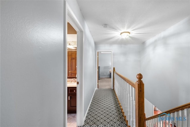 9627 Sheffield Rd, Perrysburg, OH 43551 - hallway with an upstairs landing and a sink