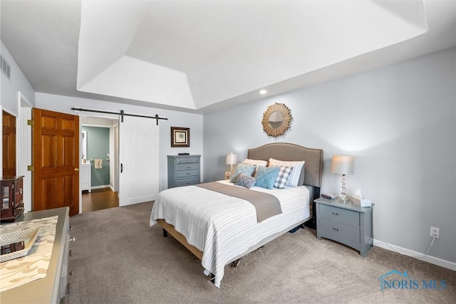 9627 Sheffield Rd, Perrysburg, OH 43551 - bedroom featuring a tray ceiling, carpet, and a barn door