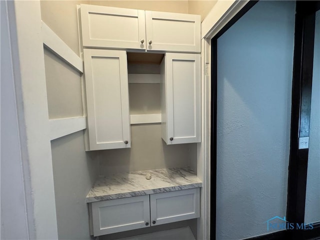 331 Buckeye St, Toledo, OH 43611 - kitchen featuring white cabinets and light stone countertops