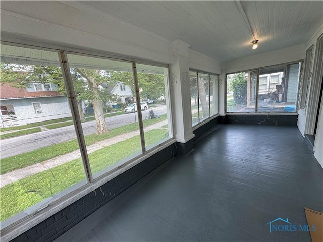 331 Buckeye St, Toledo, OH 43611 - unfurnished sunroom featuring ornamental molding and wood finished floors