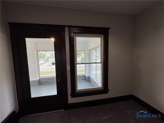 331 Buckeye St, Toledo, OH 43611 - doorway to outside featuring baseboards