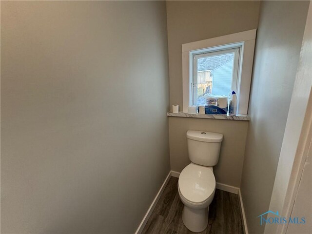 331 Buckeye St, Toledo, OH 43611 - bathroom with toilet and wood finished floors
