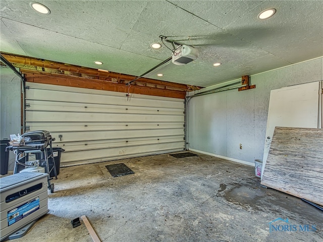 1323 Richland St, Maumee, OH 43537 - garage featuring a garage door opener and recessed lighting