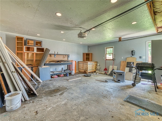 1323 Richland St, Maumee, OH 43537 - garage featuring a garage door opener and recessed lighting