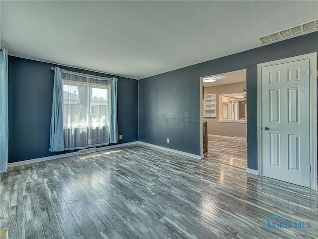 1323 Richland St, Maumee, OH 43537 - spare room with wood finished floors