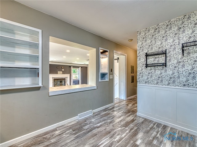1323 Richland St, Maumee, OH 43537 - corridor with wood finished floors, wainscoting, and wallpapered walls