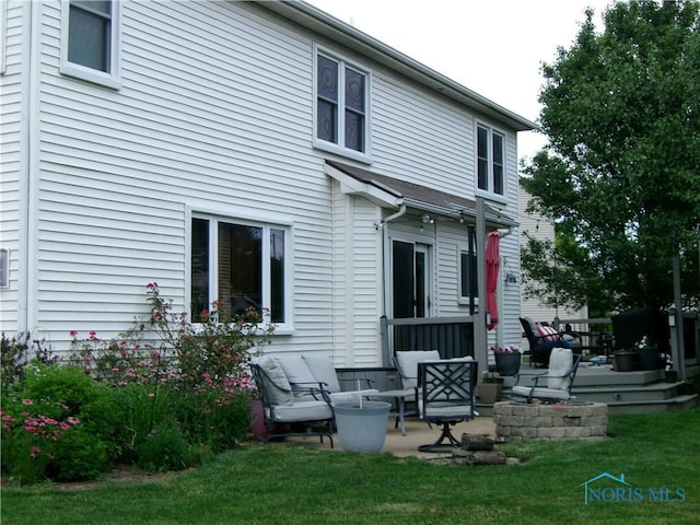 26608 Amberwood Dr, Perrysburg, OH 43551 - back of property with a lawn