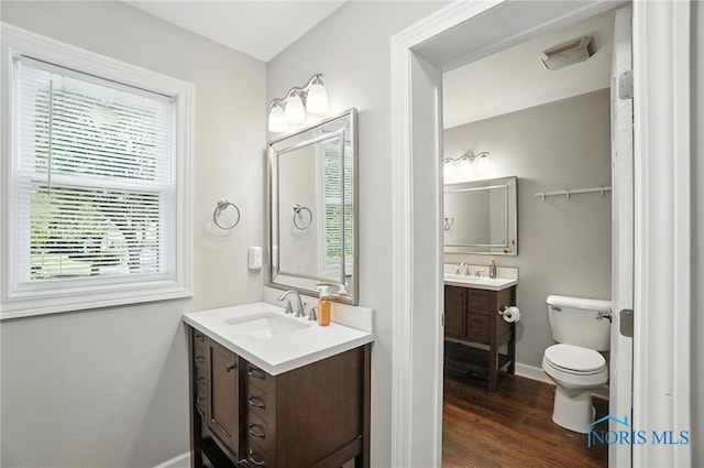 845 Oak Knoll Dr, Perrysburg, OH 43551 - bathroom with vanity and wood finished floors