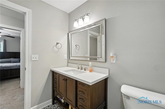 845 Oak Knoll Dr, Perrysburg, OH 43551 - bathroom featuring vanity, ensuite bathroom, and ceiling fan