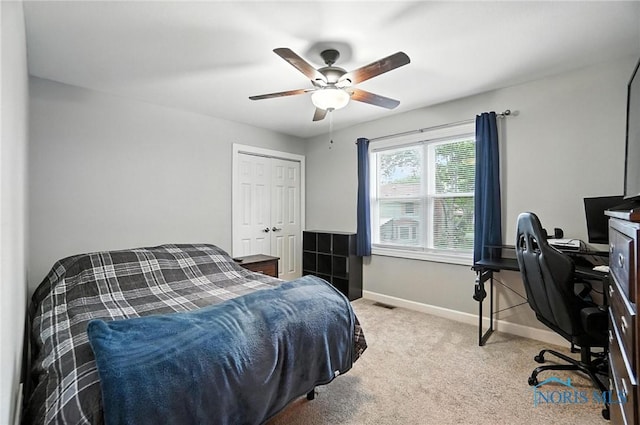 845 Oak Knoll Dr, Perrysburg, OH 43551 - bedroom with carpet, an office area, a ceiling fan, and a closet