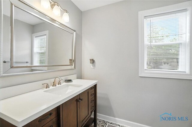 845 Oak Knoll Dr, Perrysburg, OH 43551 - bathroom featuring vanity and baseboards