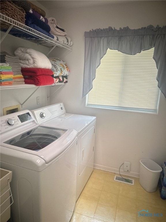 4125 Meadow Green Dr, Sylvania, OH 43560 - washroom featuring separate washer and dryer and baseboards