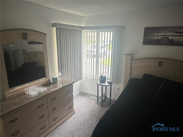 4125 Meadow Green Dr, Sylvania, OH 43560 - bedroom with carpet flooring and baseboards