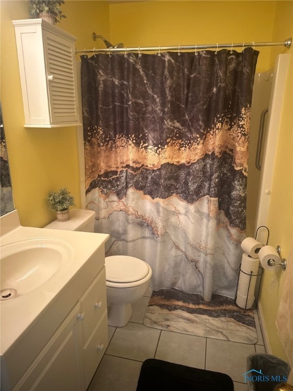 4125 Meadow Green Dr, Sylvania, OH 43560 - bathroom featuring vanity, tile patterned flooring, and curtained shower