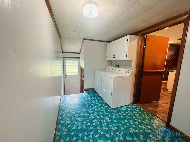 714 Westwood Dr, Defiance, OH 43512 - laundry room with cabinet space and separate washer and dryer