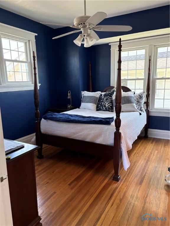 643 S Clinton St, Defiance, OH 43512 - bedroom featuring wood finished floors and a ceiling fan