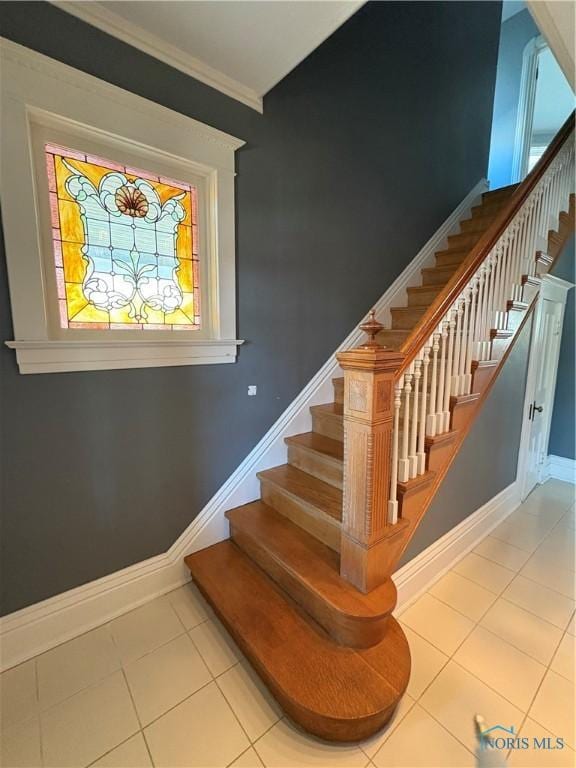 643 S Clinton St, Defiance, OH 43512 - staircase featuring tile patterned floors and ornamental molding