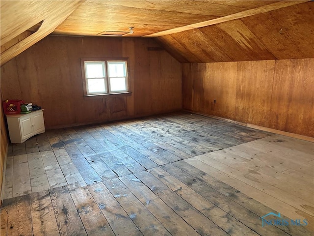 643 S Clinton St, Defiance, OH 43512 - bonus room featuring hardwood / wood-style floors, vaulted ceiling, wooden ceiling, and wood walls