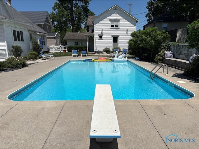 643 S Clinton St, Defiance, OH 43512 - view of pool with a patio and a diving board