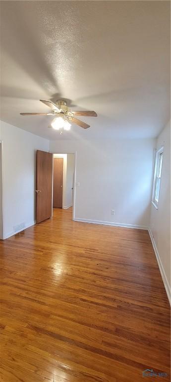 2550 Secor Rd, Toledo, OH 43606 - spare room with ceiling fan and light wood-style floors