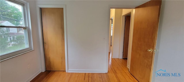 2550 Secor Rd, Toledo, OH 43606 - unfurnished bedroom with light wood-style floors
