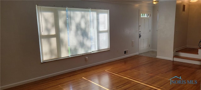 2550 Secor Rd, Toledo, OH 43606 - entryway with baseboards and wood finished floors