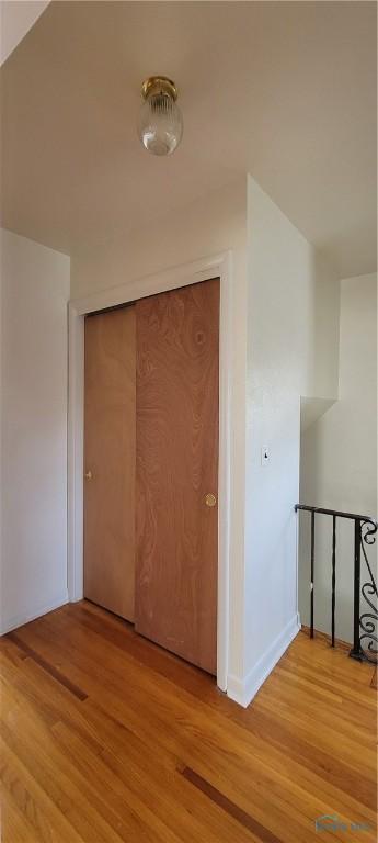 2550 Secor Rd, Toledo, OH 43606 - hall with light wood-style flooring and baseboards