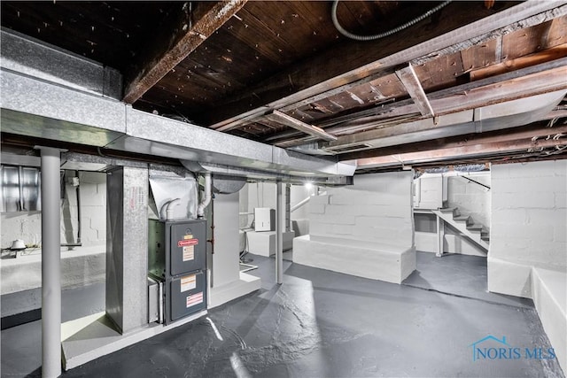 2825 N Mccord Rd, Toledo, OH 43615 - unfinished basement featuring stairs and heating unit