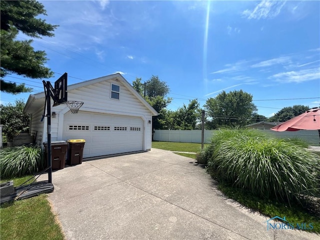 2225 Power Dam Rd, Defiance, OH 43512 - view of property exterior with a detached garage and an outdoor structure
