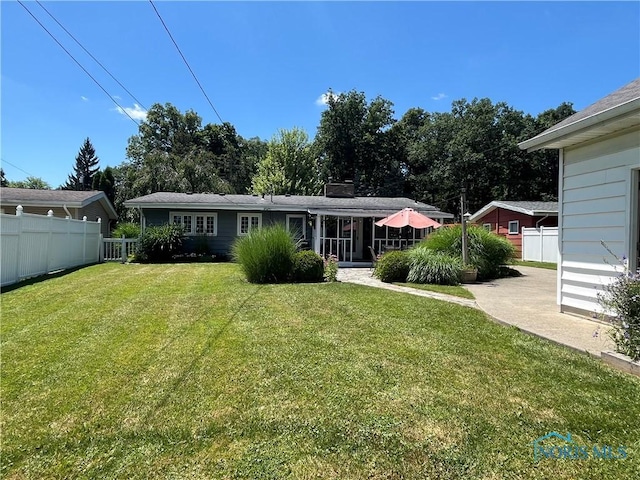 2225 Power Dam Rd, Defiance, OH 43512 - back of house featuring a sunroom