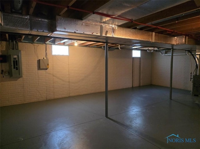 1311 Fitchland Ave, Toledo, OH 43606 - basement featuring electric panel and plenty of natural light