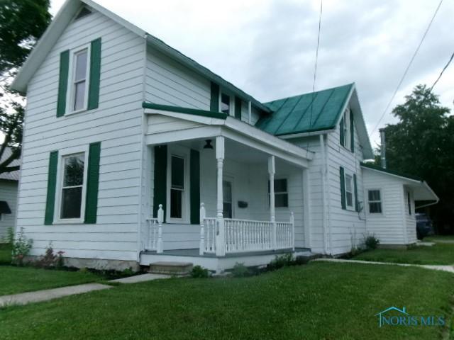 530 N Taft Ave, Ottawa, OH 45875 - view of front facade featuring a porch and a front yard