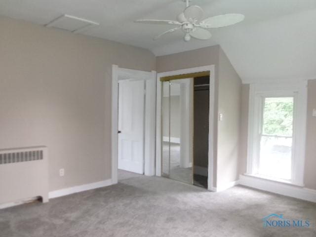 530 N Taft Ave, Ottawa, OH 45875 - unfurnished bedroom with radiator, carpet flooring, a closet, and a ceiling fan