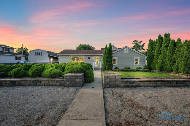 855 Strotz Dr, Toledo, OH 43612 - view of front of home with a front lawn