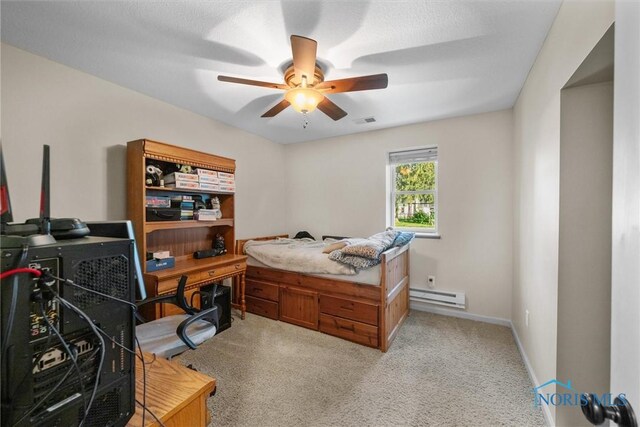 855 Strotz Dr, Toledo, OH 43612 - bedroom with a baseboard radiator, light colored carpet, a desk, and ceiling fan