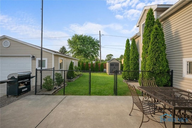 855 Strotz Dr, Toledo, OH 43612 - view of patio / terrace with a garage, a shed, outdoor dining space, and area for grilling