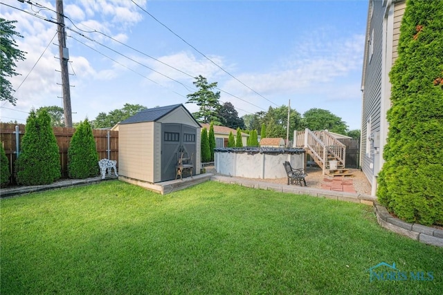 855 Strotz Dr, Toledo, OH 43612 - fenced backyard with a storage shed