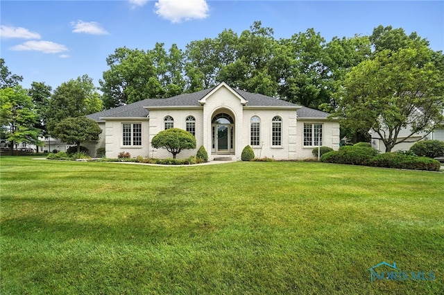 8076 Trent Lock Dr, Waterville, OH 43566 - view of front facade featuring a front lawn and roof with shingles