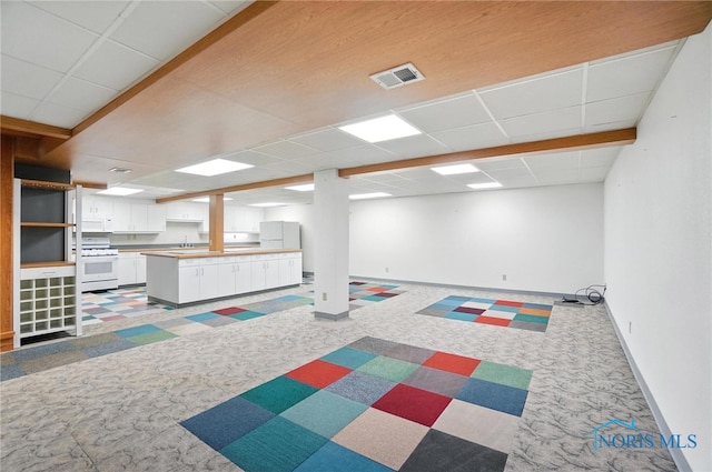8076 Trent Lock Dr, Waterville, OH 43566 - finished below grade area featuring carpet flooring and a drop ceiling