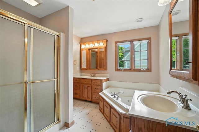 8076 Trent Lock Dr, Waterville, OH 43566 - bathroom featuring a shower stall, vanity, a tub with jets, and tile patterned floors