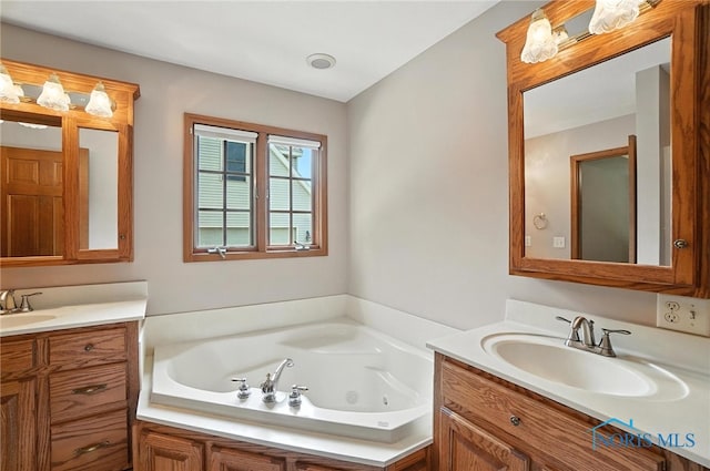 8076 Trent Lock Dr, Waterville, OH 43566 - full bath with two vanities and a whirlpool tub