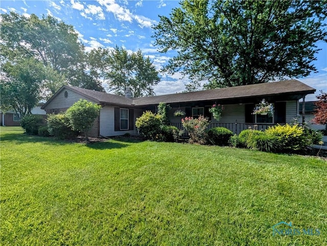 209 Hawthorn Dr, Archbold, OH 43502 - single story home with a front yard