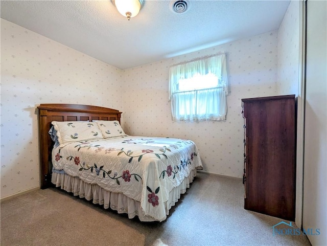209 Hawthorn Dr, Archbold, OH 43502 - bedroom with light colored carpet and wallpapered walls