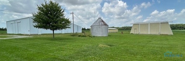 18375 County Road R, Alvordton, OH 43501 - view of green lawn featuring an outbuilding