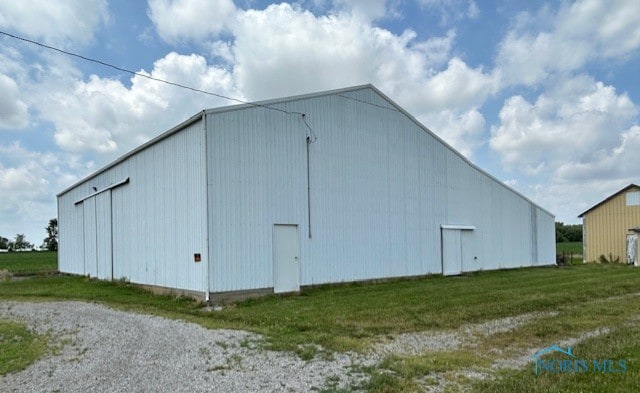18375 County Road R, Alvordton, OH 43501 - view of pole building featuring a lawn