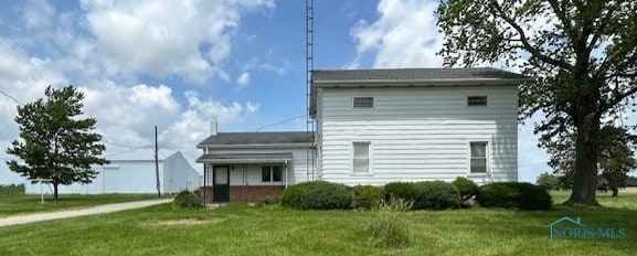 18375 County Road R, Alvordton, OH 43501 - view of side of property featuring a yard