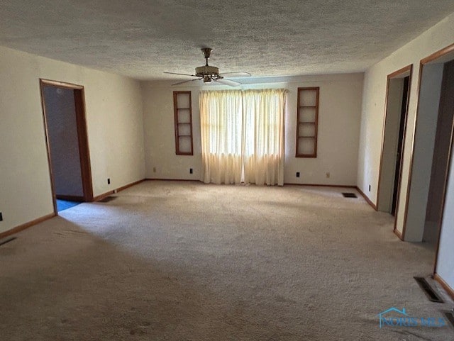 18375 County Road R, Alvordton, OH 43501 - carpeted empty room with built in features, a ceiling fan, and a textured ceiling