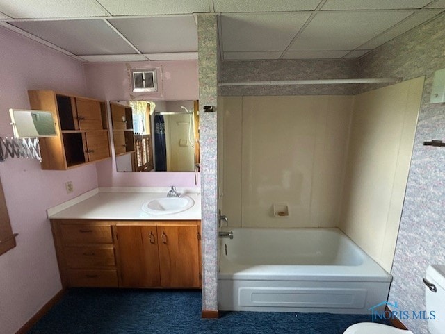 18375 County Road R, Alvordton, OH 43501 - full bathroom featuring a drop ceiling, vanity, and  shower combination
