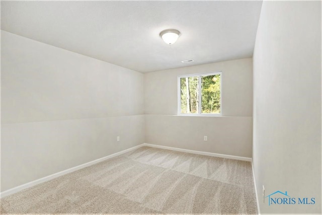 1487 Lee Ann Ave, Defiance, OH 43512 - empty room featuring baseboards and carpet